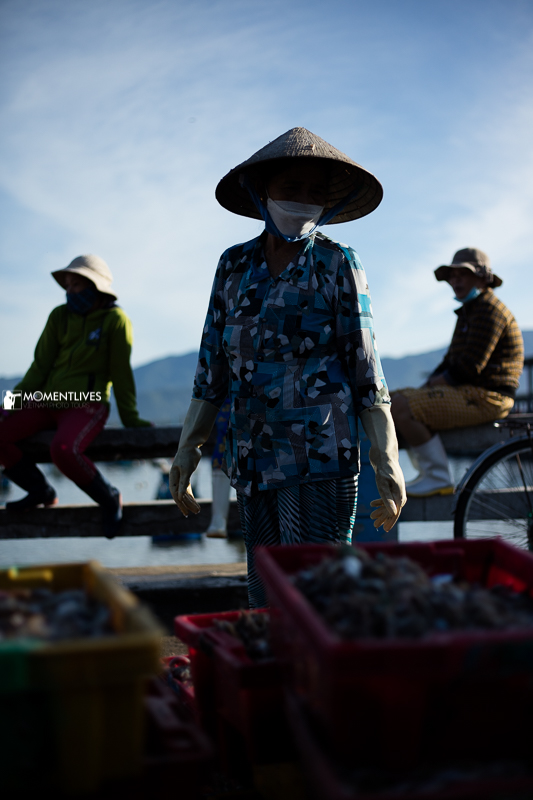 A scene of some women sitting at Doc Let beach, one destination on our Vietnam photography tour to Nha Trang