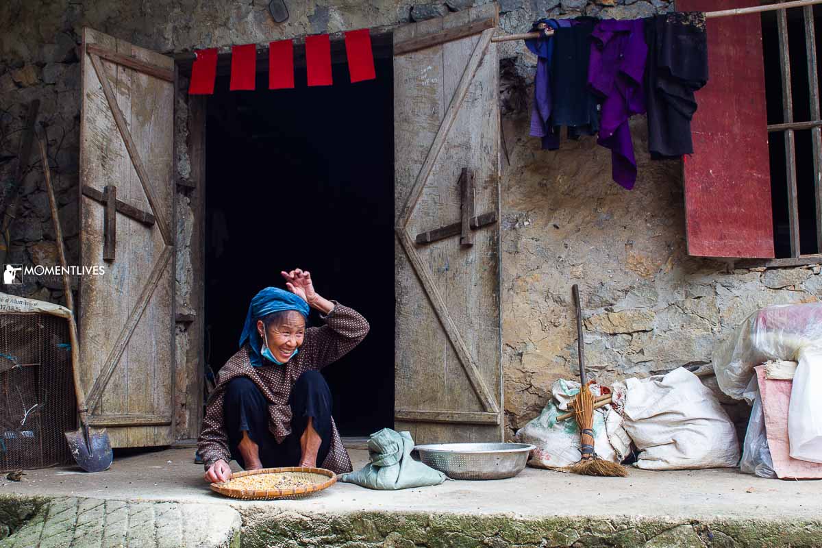 A lady sitting in front of her house in Cao Bang, Vietnam