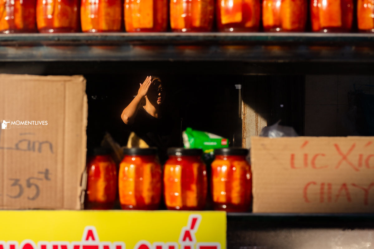 Portrait of a lady shop keeper in Sa Dec market