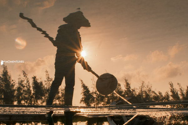 A farmer making salt in Nam Dinh