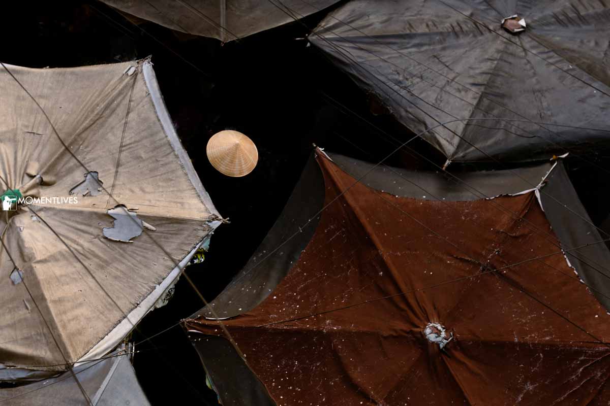 A market in Saigon with umbrellas on top